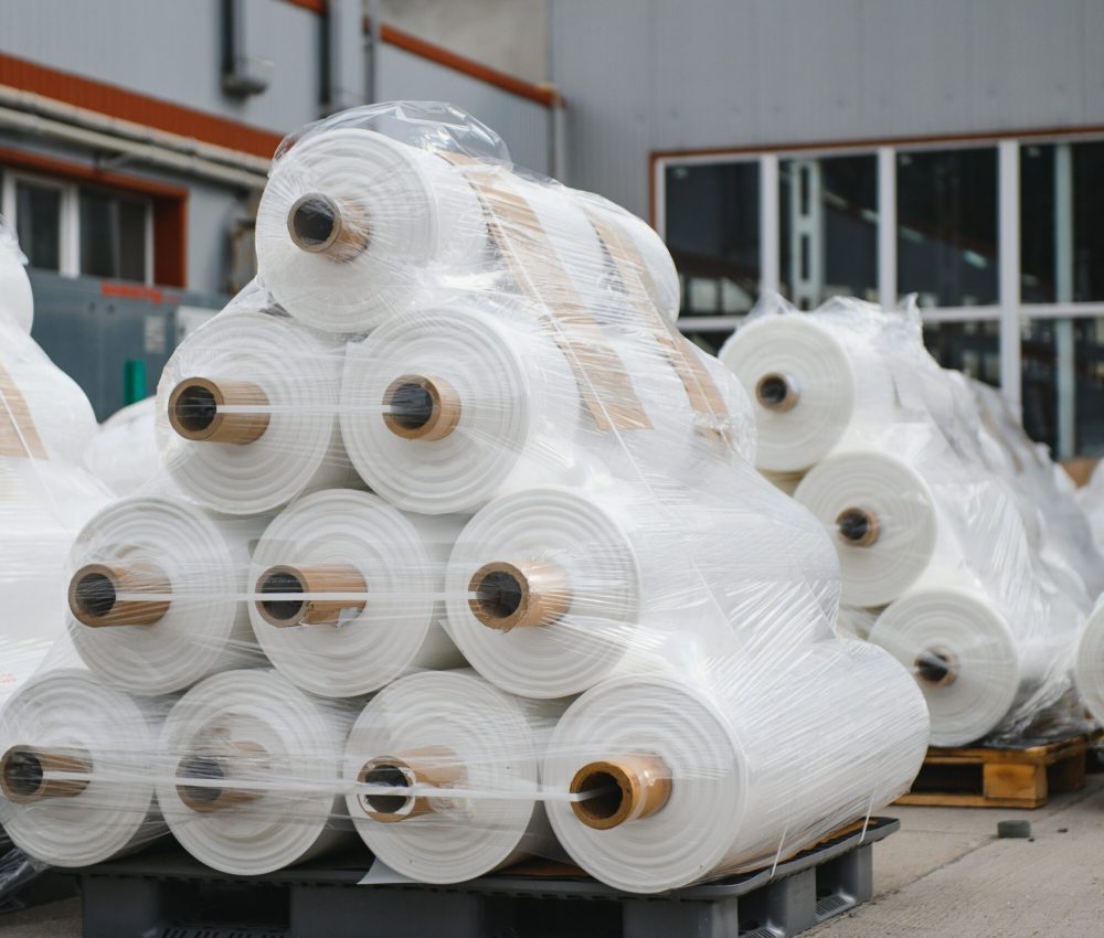 roll of white fabric for cutting